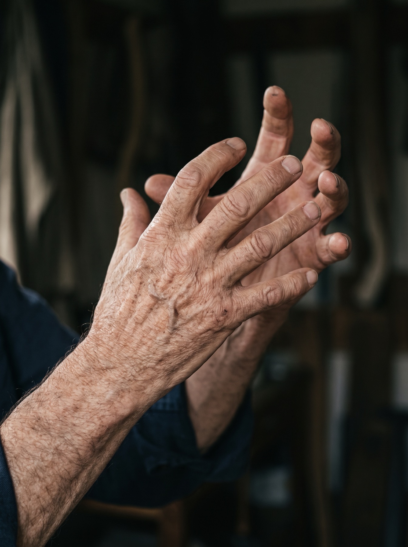 A teacher's hands shaping an adjustment